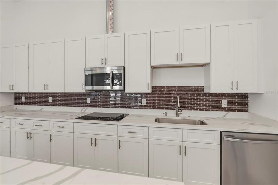 Furnished interior view inside a new home in , Port Charlotte (Image 11).