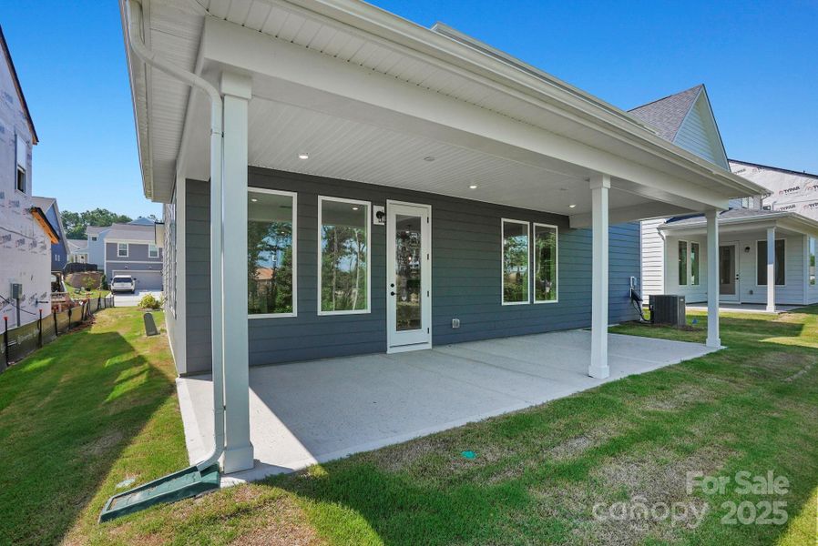 Front exterior of a new home in Cannon Run, Concord, NC, highlighting curb appeal (Image 21). Front exterior of a new home in Cannon Run, Concord, NC, highlighting curb appeal (Image 21).