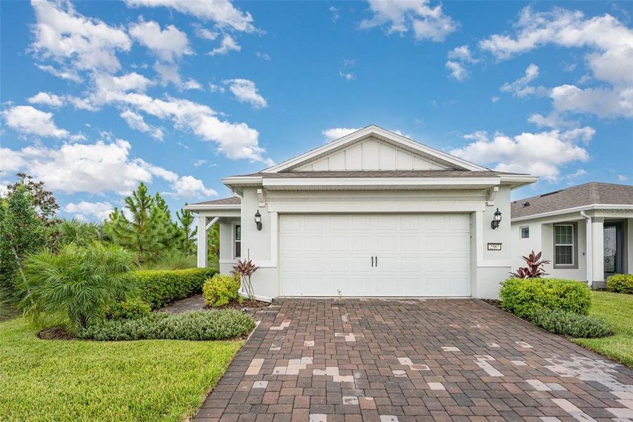 Front exterior of a new home in , St. Cloud, FL, highlighting curb appeal (Image 14).