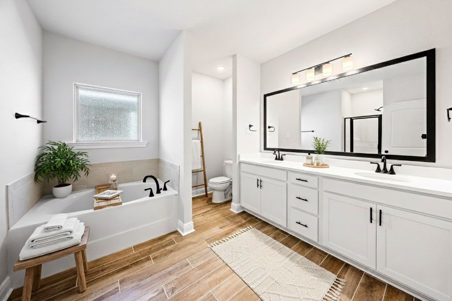 Front exterior of a new home in The Bluffs at Lafayette, Freeport, FL, highlighting curb appeal (Image 16).