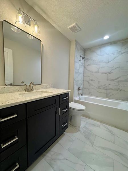 Furnished interior view inside a new home in , Dunnellon (Image 7).