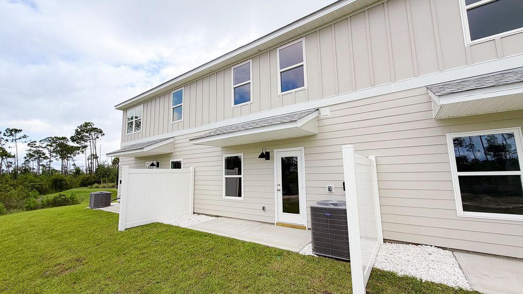Exterior details and patio area of a home in WindMark Beach, Port Saint Joe (Image 4).