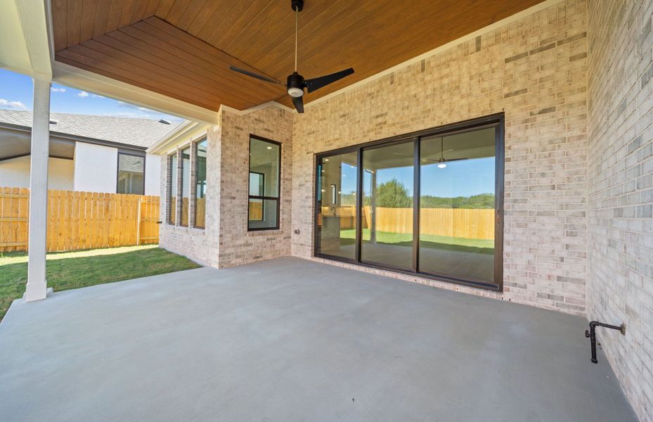 Exterior details and patio area of a home in 6 Creeks, Kyle (Image 24).