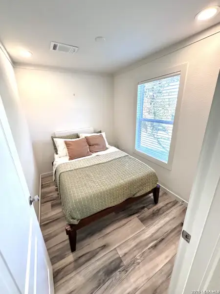 Furnished interior view inside a new home in , Lakehills (Image 13).
