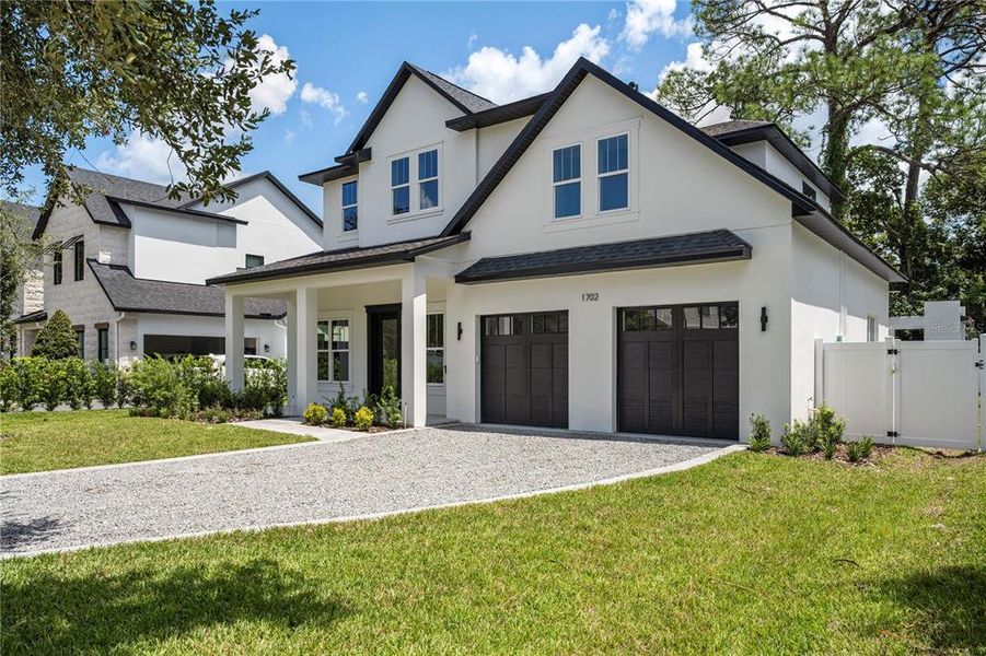 Front exterior of a new home in , Winter Park, FL, highlighting curb appeal (Image 26).