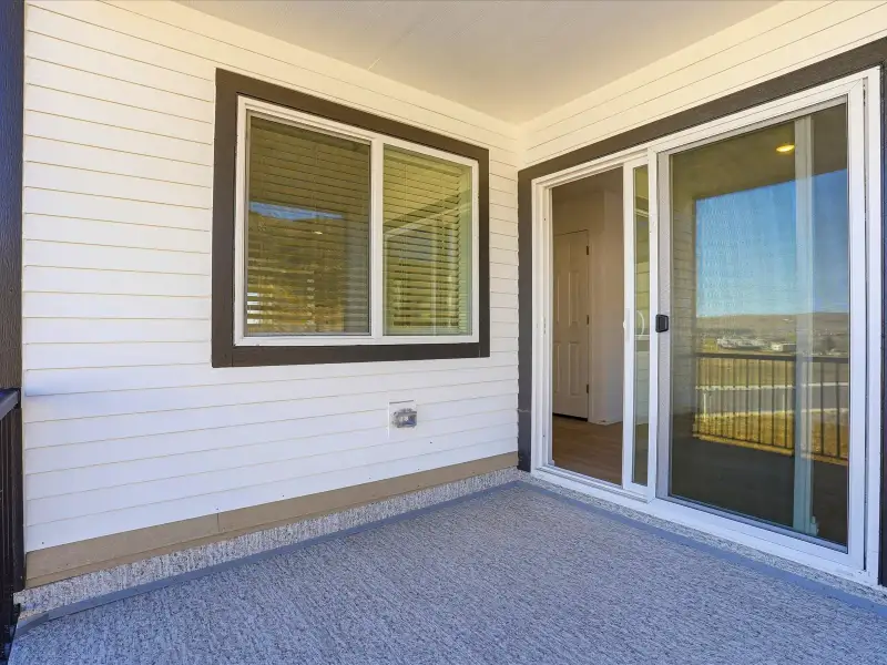 Exterior details and patio area of a home in Three Hills, Morrison (Image 3).