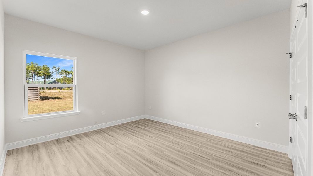 Representative unfurnished interior of a home built from the The Destin by D.R. Horton in Pine Creek and Heron Walk, Port St. Joe (Image 33).