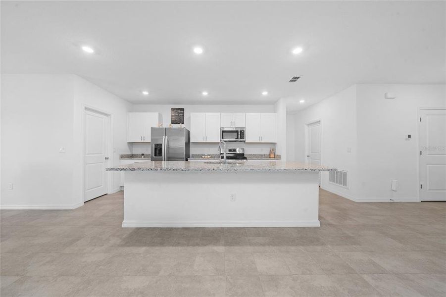 Furnished interior view inside a new home in Waterstone, Groveland (Image 11).