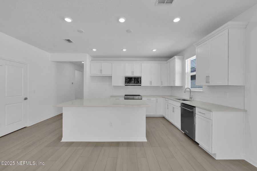 Furnished interior view inside a new home in Bradley Creek, Green Cove Springs (Image 8).