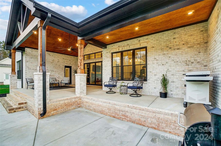 More covered seating area on back porch