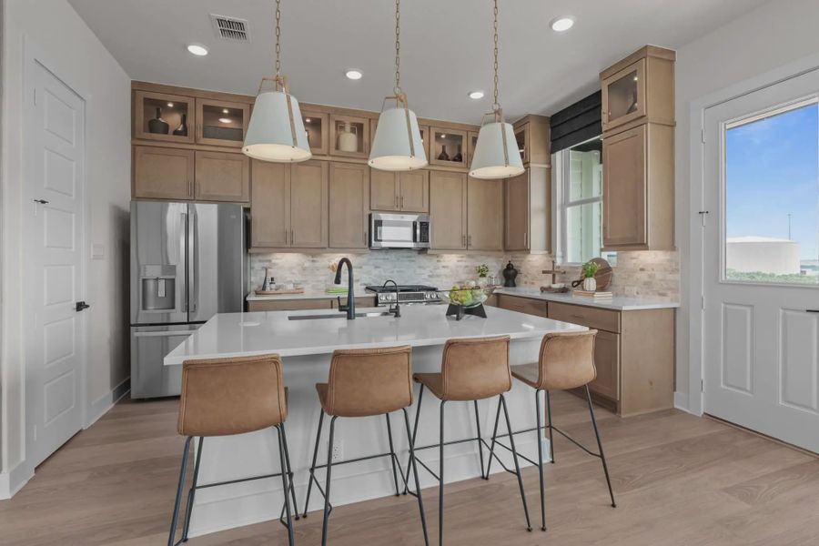Furnished interior view inside a new home in Centero at Stone Oak, San Antonio (Image 2).