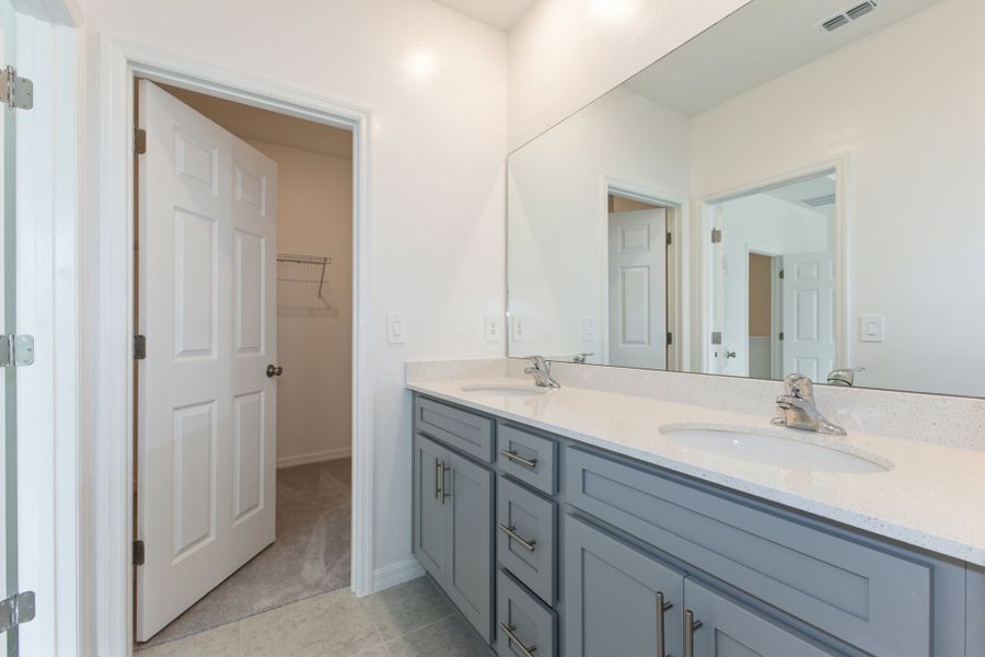 Representative furnished interior of a home built from the Carter by Park Square Residential in Townwalk at Babcock Ranch, Punta Gorda (Image 6).