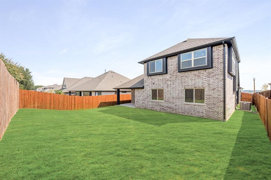 Front exterior of a new home in Country Lakes Classic 50, Denton, TX, highlighting curb appeal (Image 25).