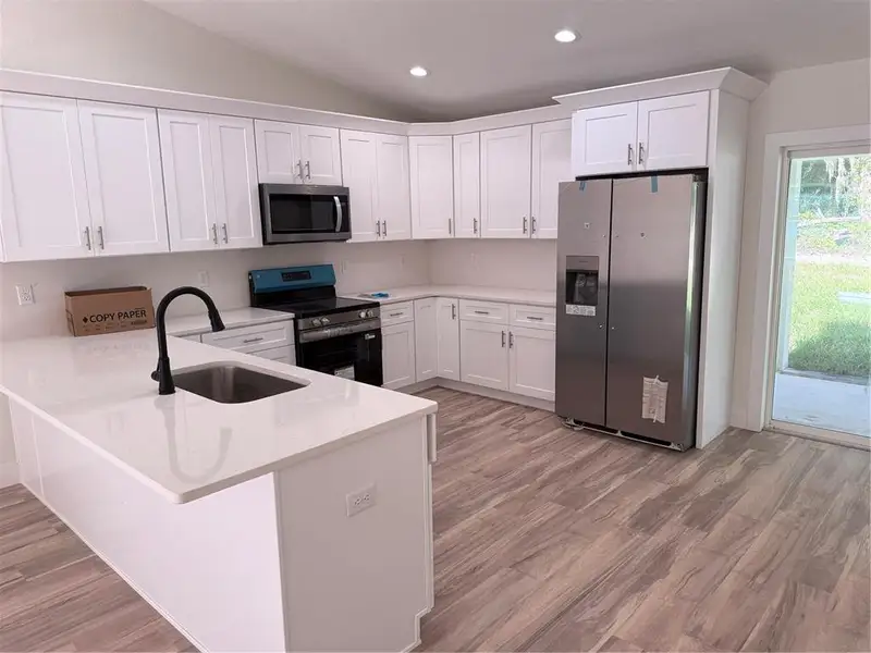 Furnished interior view inside a new home in , Ocala (Image 6).