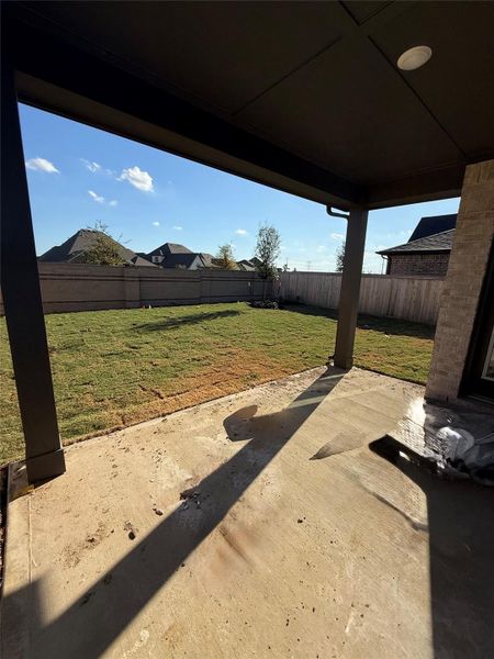 Expansive outdoor covered patio with its open design allows fresh air and natural light in while protecting from the elements.
