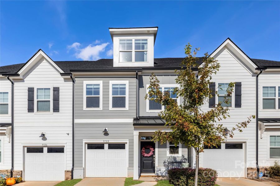 Front exterior of a new home in , Charlotte, NC, highlighting curb appeal (Image 22).