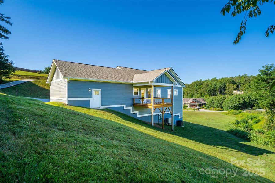 Front exterior of a new home in , Leicester, NC, highlighting curb appeal (Image 16).