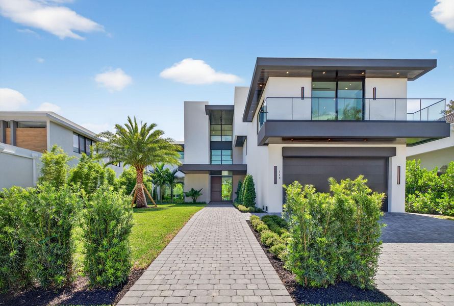 Front exterior of a new home in , Fort Lauderdale, FL, highlighting curb appeal (Image 22). Front exterior of a new home in , Fort Lauderdale, FL, highlighting curb appeal (Image 22).