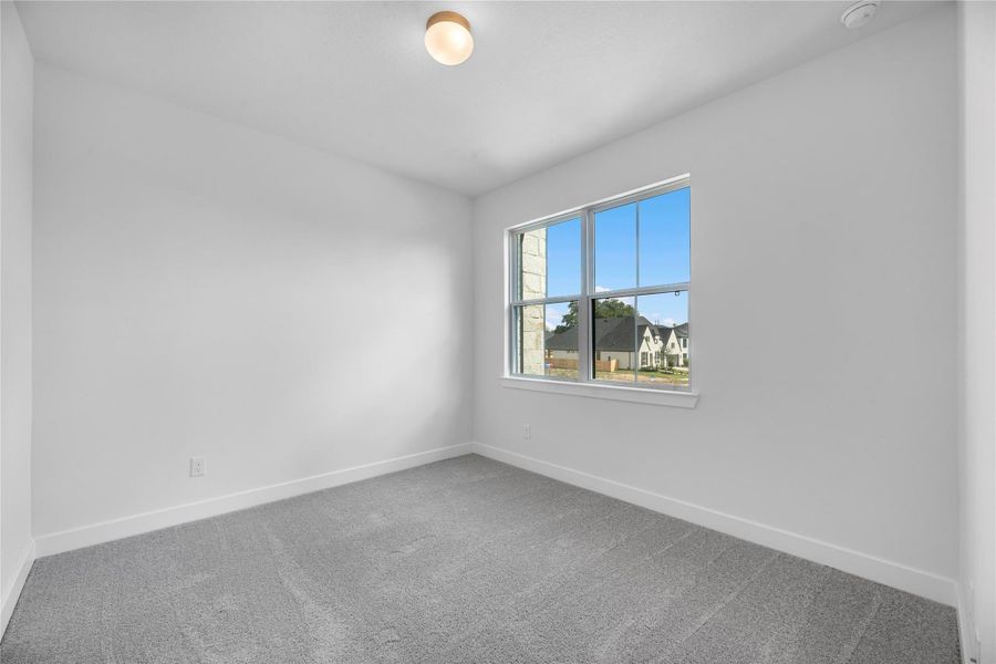 Spacious, unfurnished interior of a new home in Sienna, Missouri City (Image 16).