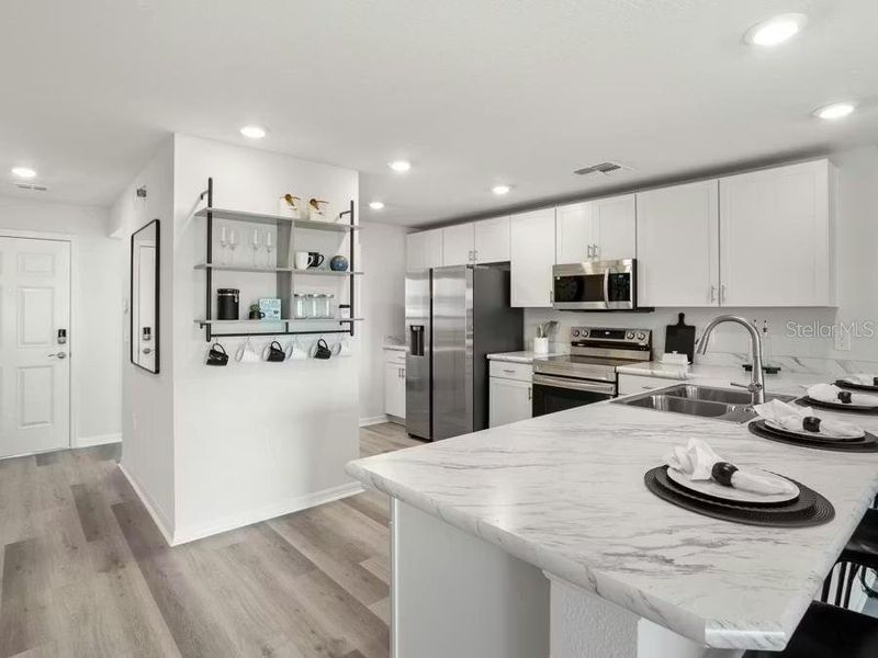 Furnished interior view inside a new home in , Winter Haven (Image 7).