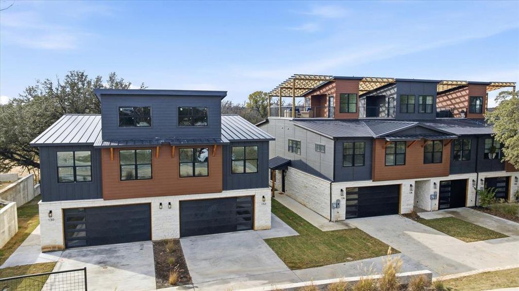 Front exterior of a new home in , Stephenville, TX, highlighting curb appeal (Image 21).