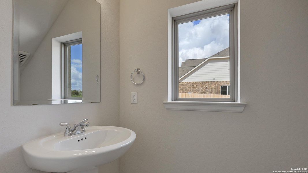 Furnished interior view inside a new home in Ladera 40', San Antonio (Image 12).
