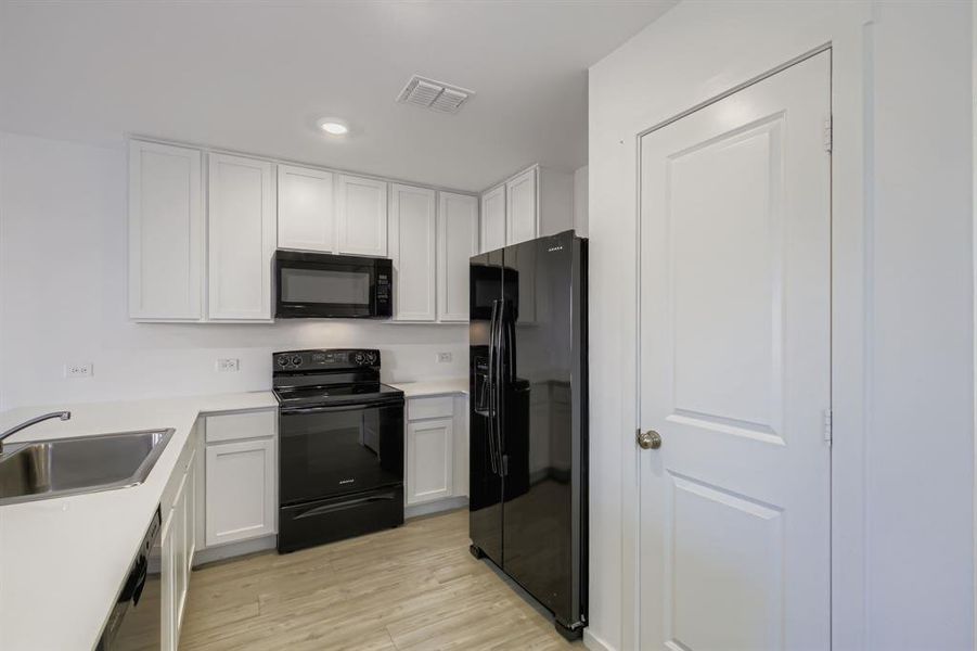 Furnished interior view inside a new home in Tillage Farms: Wellton Haven, Princeton (Image 8).