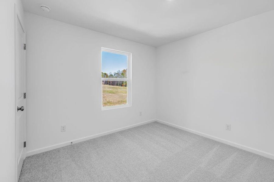 Spacious, unfurnished interior of a new home in Windance Lake, Loganville (Image 30).