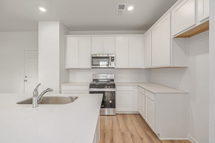 Furnished interior view inside a new home in Painted Prairie, Aurora (Image 9). Furnished interior view inside a new home in Painted Prairie, Aurora (Image 9).
