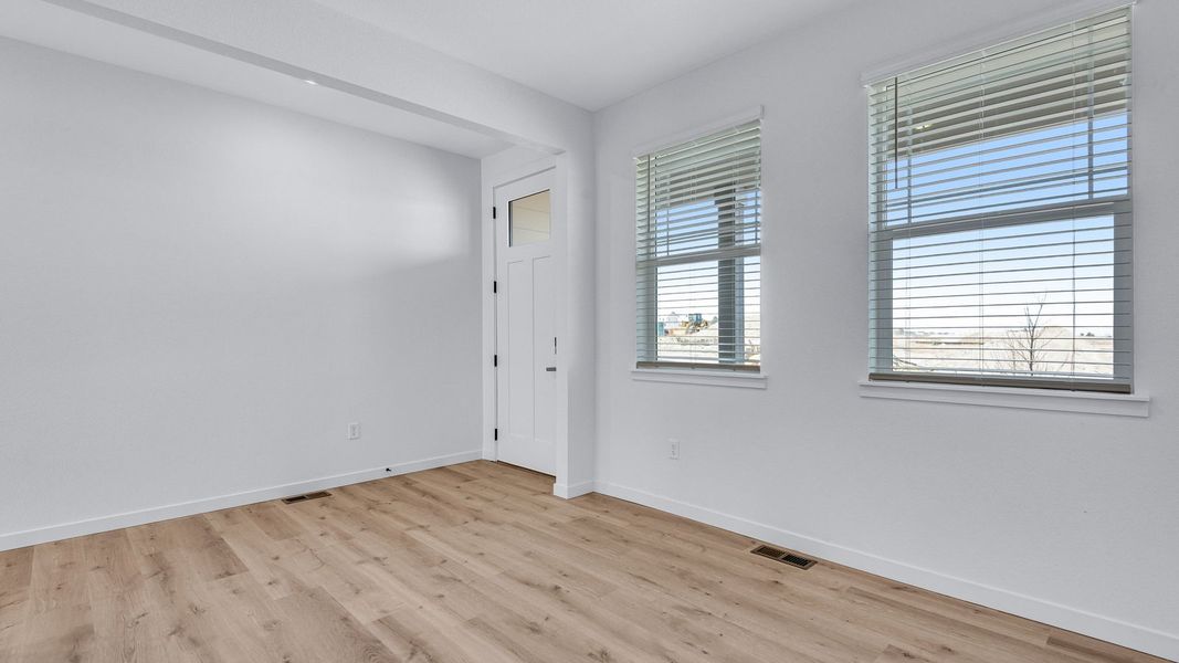 Spacious, unfurnished interior of a new home in Trails at Crowfoot, Parker (Image 15).