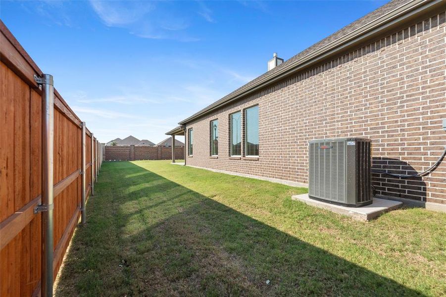 Exterior details and patio area of a home in Northstar, Haslet (Image 2).