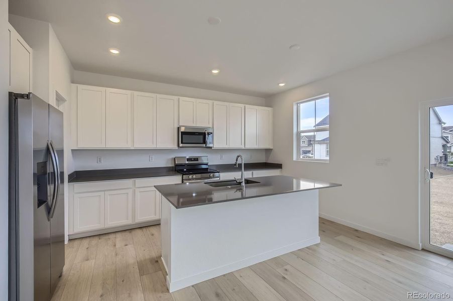 Furnished interior view inside a new home in , Loveland (Image 8).