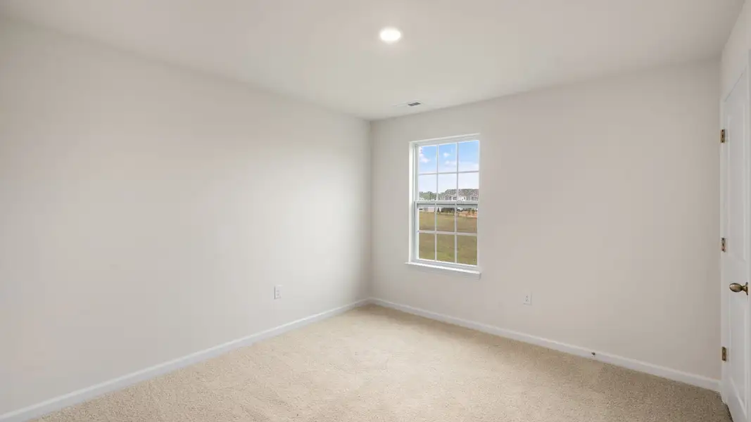 Spacious, unfurnished interior of a new home in The Reserve at Prestleigh, Wake Forest (Image 32).