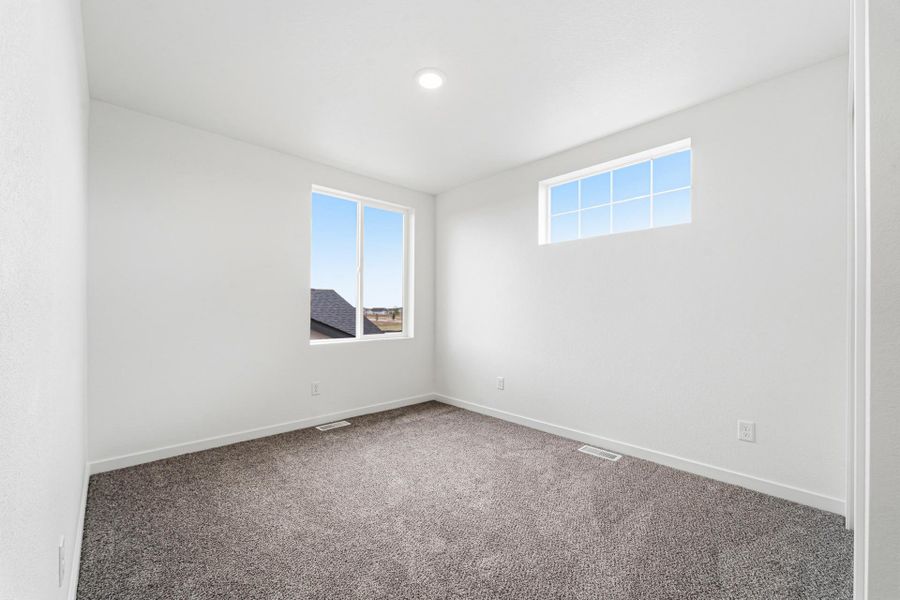 Spacious, unfurnished interior of a new home in Granary, Johnstown (Image 40).