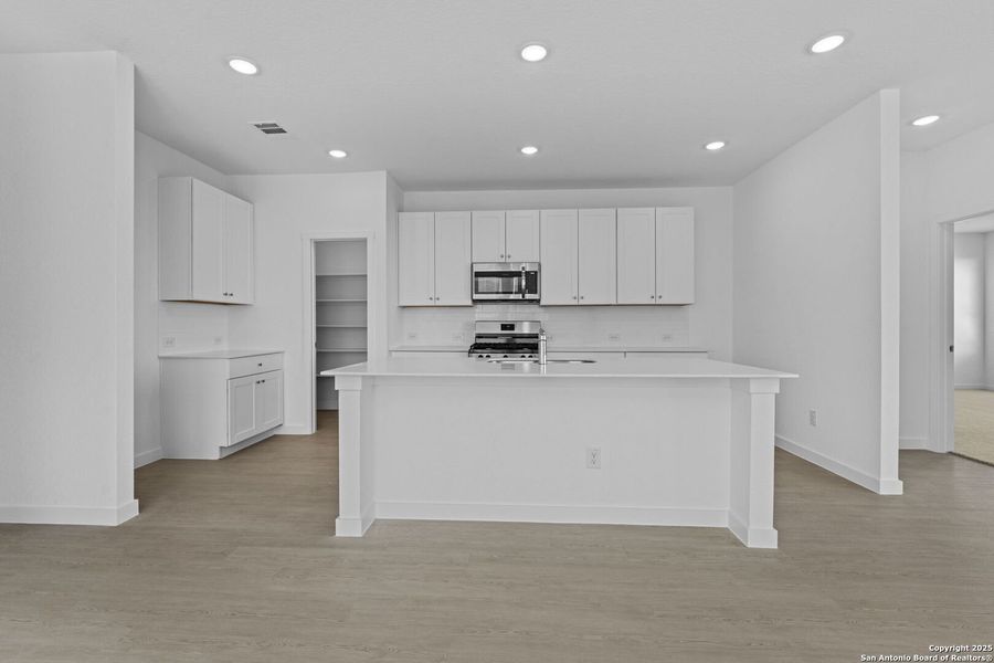 Furnished interior view inside a new home in Waterwheel: Coastline Collection, San Antonio (Image 8).