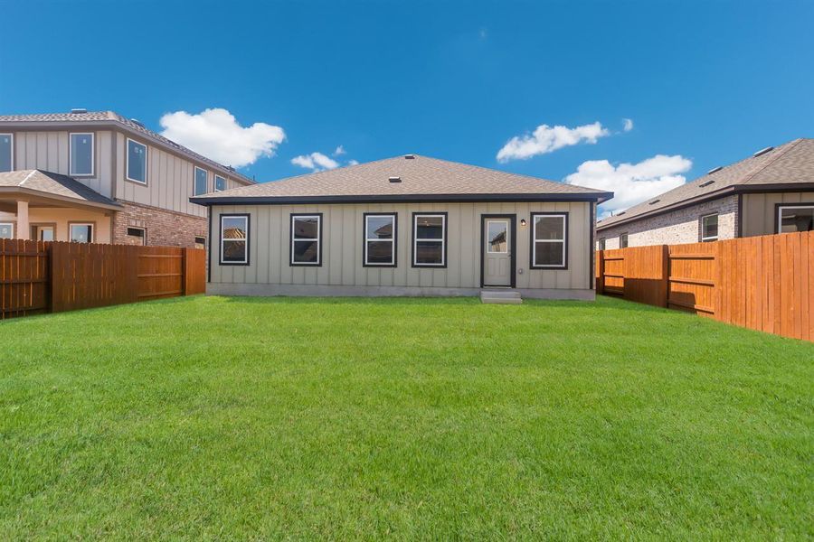 Front exterior of a new home in Oaks at San Gabriel, Georgetown, TX, highlighting curb appeal (Image 2).