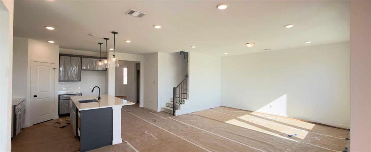 Open Kitchen-Living Room Construction Progress featuring the Minimalist Collection