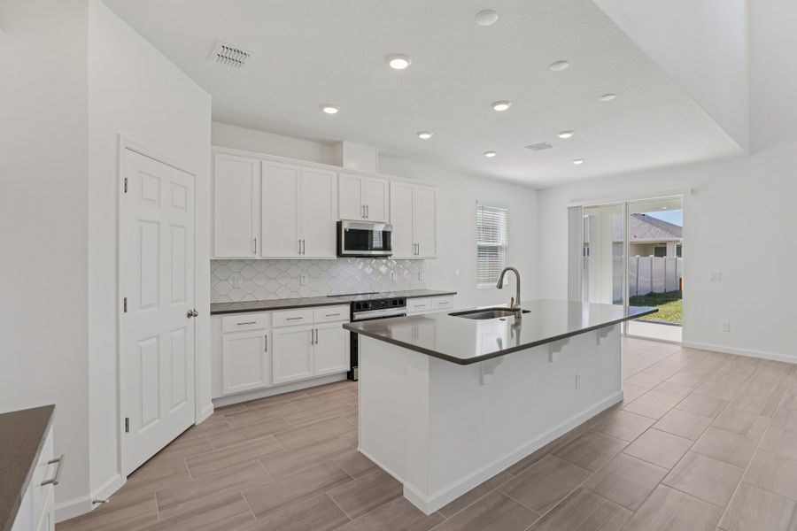 Furnished interior view inside a new home in St. Johns Preserve, Palm Bay (Image 4).