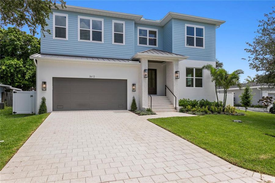 Front exterior of a new home in , Tampa, FL, highlighting curb appeal (Image 30).