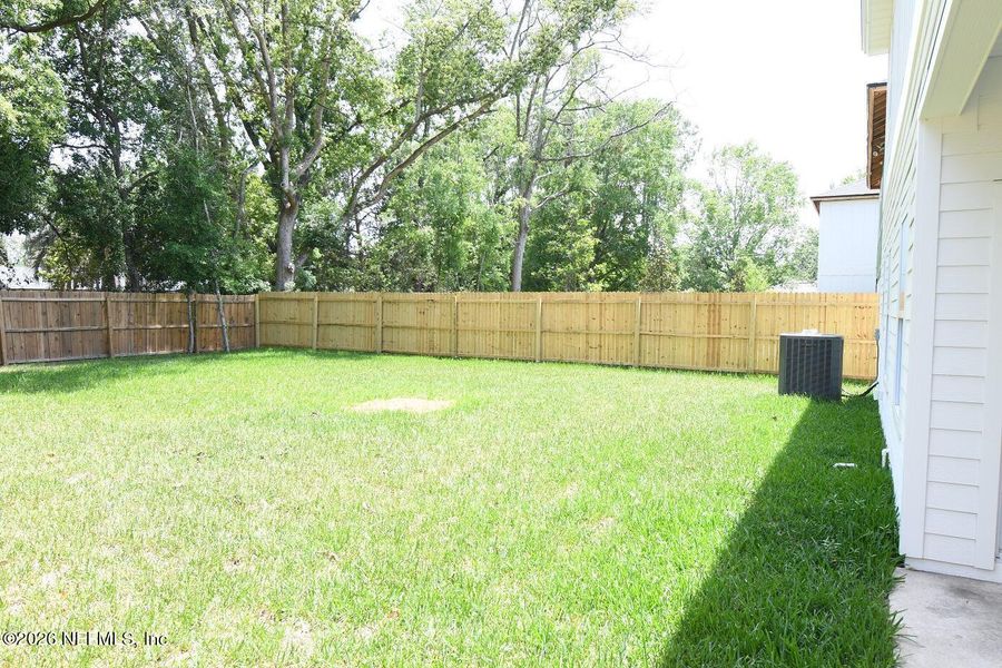 Exterior details and patio area of a home in , Jacksonville (Image 4). Exterior details and patio area of a home in , Jacksonville (Image 4).