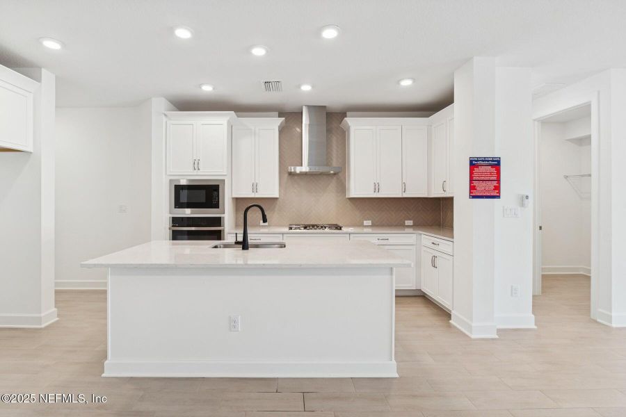 Furnished interior view inside a new home in Evergreen Island at Silverleaf - Classic, St. Augustine (Image 5).