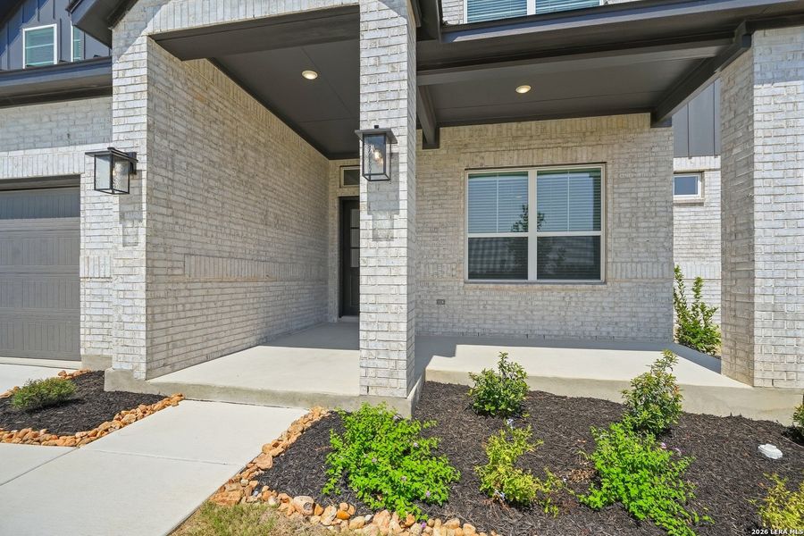 Exterior details and patio area of a home in Prominence Urban, San Antonio (Image 26).