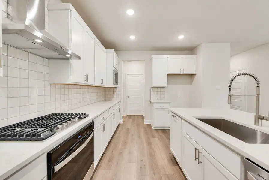 Furnished interior view inside a new home in Spiritas Ranch, Little Elm (Image 9).