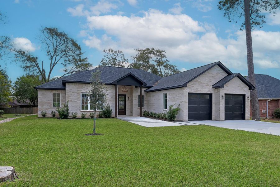 Front exterior of a new home in , Huntsville, TX, highlighting curb appeal (Image 2). Front exterior of a new home in , Huntsville, TX, highlighting curb appeal (Image 2).