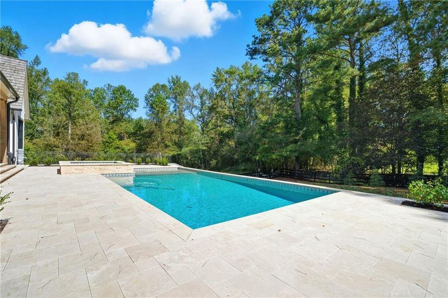 Exterior details and patio area of a home in Crossroads, Alpharetta (Image 28).