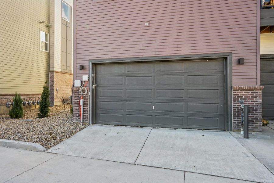 A garage door with a metal gate. A garage door with a metal gate.