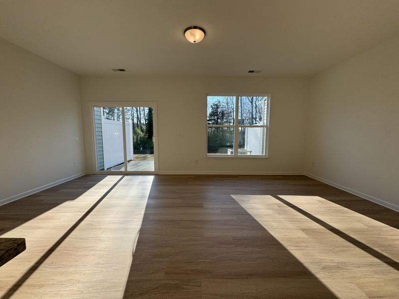 Spacious, unfurnished interior of a new home in East Main Townes, Spartanburg (Image 11).