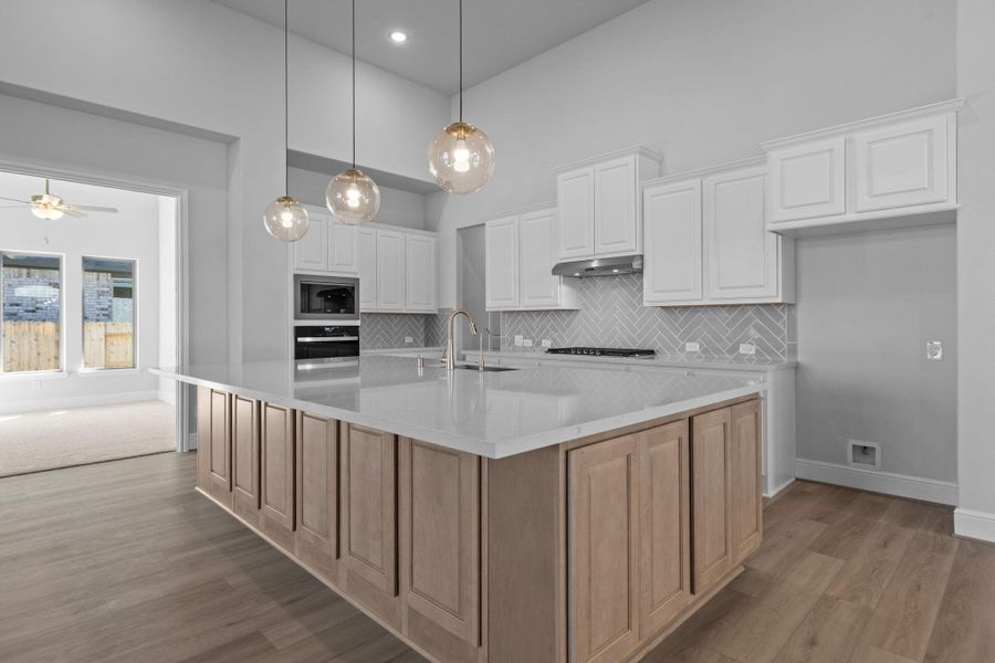 Furnished interior view inside a new home in Valencia 70', Manvel (Image 6).