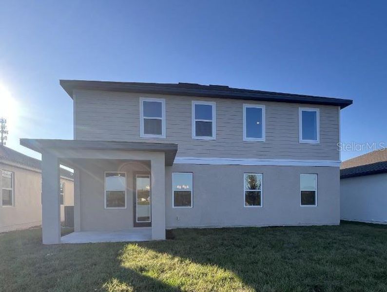 Exterior details and patio area of a home in Hawks Run, Kissimmee (Image 3). Exterior details and patio area of a home in Hawks Run, Kissimmee (Image 3).