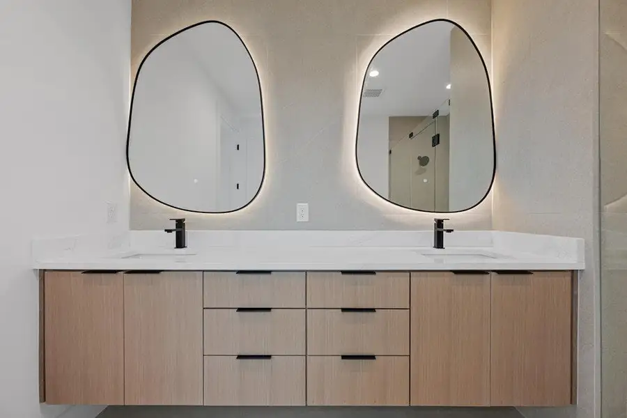 Bathroom featuring double vanity
